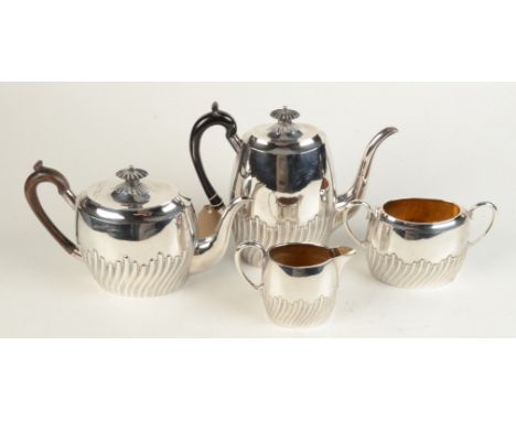 A four piece half fluted tea and coffee service.