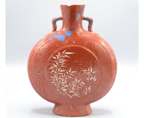 A Chinese porcelain pilgrim flask, 19th century, the centre decorated with bamboo, height 30cm.   Condition report:  Conditio