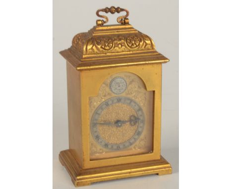A miniature gilt metal bracket clock, 20th century, the movement impressed '15 jewels, Swiss Lever Escapement C.244', height 