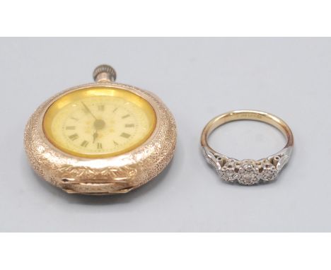 An 18ct gold cased fob watch and an 18ct gold ring, the illusion set with three diamonds. 