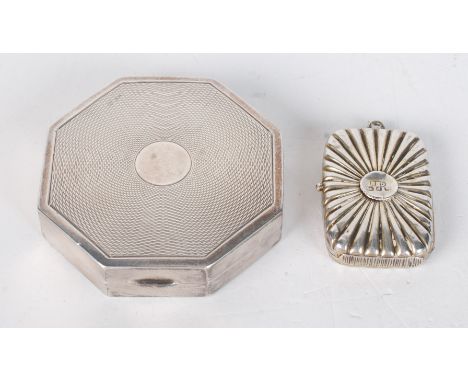 An octagonal engine turned silver matchbox and a silver late Victorian vesta case.