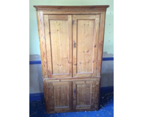 Double height Georgian pine corner cupboard lacking bracket feet