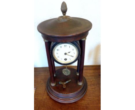 A 19th c mahogany portico mantle clock