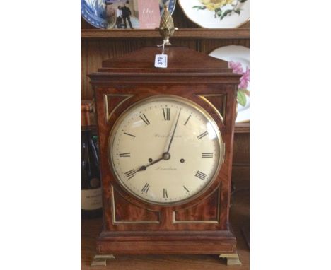 Good Regency mahogany bracket clock with pineapple finial the twin fusee movement striking on a bell by Brinkman London