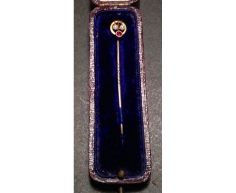 A 15ct gold, garnet and seed pearl tie pin