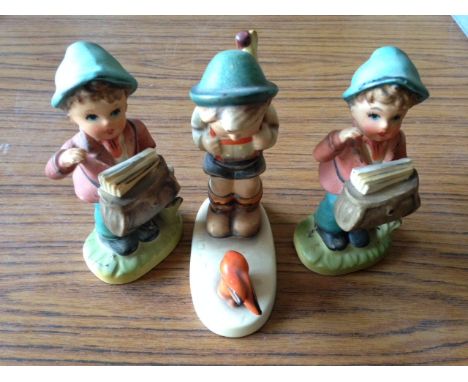 Three figures one marked Hummel
