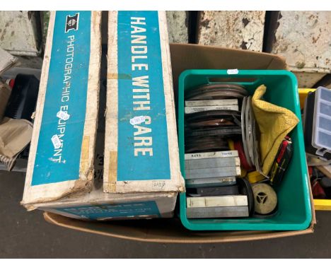 Vintage projector with various film reels etc