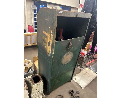 A vintage metal cased Castrol fuel pump