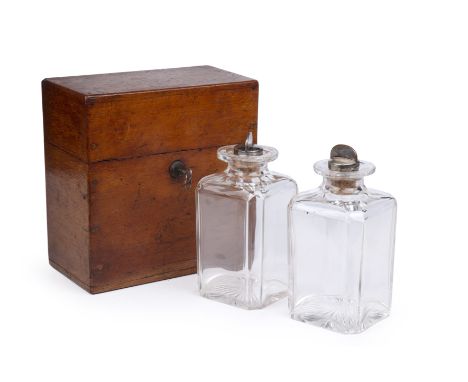 A 19th century oak tantalus/decanter box with two decanters, labelled Toulain &amp; Gale 23.5cm wide 12.5cm deep 24cm highKey