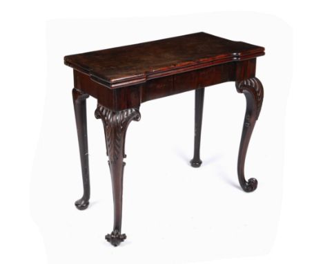 A George III mahogany fold over card table with cabriole legs and scrolling feet, 88cm wide x 44cm deep x 73cm high Provenanc