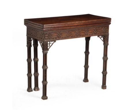 A George III Chinese Chippendale mahogany two fold games table, with a baize top and an inlaid chess board top, blind fret wo