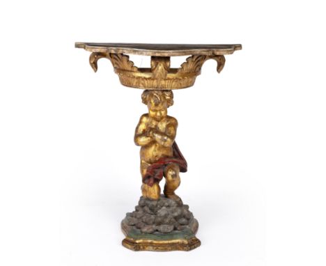 A 19th century Italian carved giltwood console table with a shaped faux marble top above a kneeling cherub on a naturalistic 