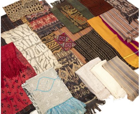 A collection of ethnic textiles to include four Sumba Ikat panels the largest 37cm x 150cm