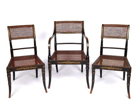 A set of three Regency painted chairs with caned backs and seats including one open armchair, the armchair 51cm wide x 48cm d