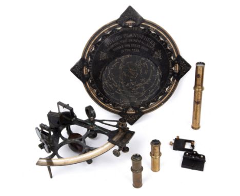 A 19th century Whitfield and Hakes brass sextant with its original box together with a Philips Planisphere (2)