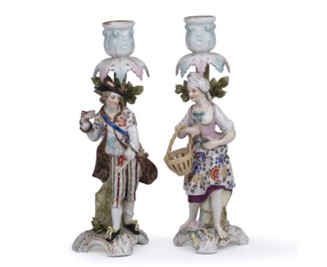 A pair Sitzendorf porcelain figural candlesticks each 25.5cm high