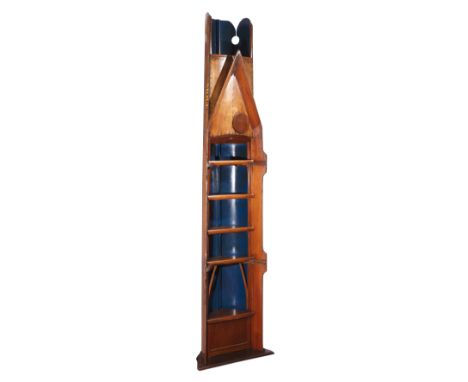 An early 20th century rowing boat section converted to a bookcase 58cm wide 34cm deep 229cm high together with an oar marked 
