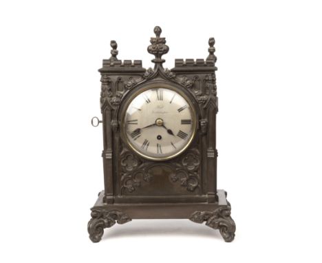 A 19th century Gothic revival mantel clock by Hall of Northampton the silvered dial with Roman numerals 28cm wide 18cm deep 4