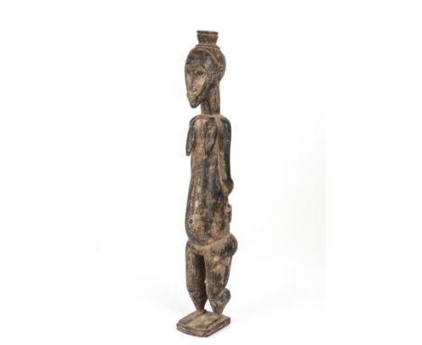 A Senufo, Ivory coast, female divination figure 10cm wide 56cm high.Purchased from Barristers Gallery, New Orleans 1999.