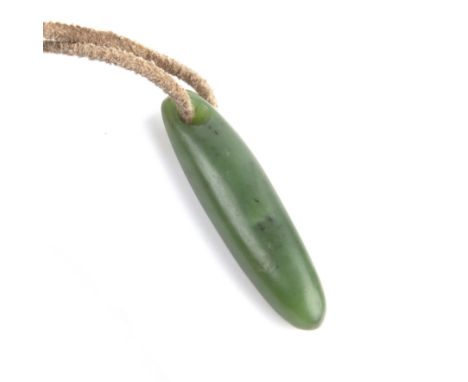 A Maori nephrite jade pounamu Kuru pendant 6cm together with a 20th century carnelian and metal work pendant of claw form 4cm