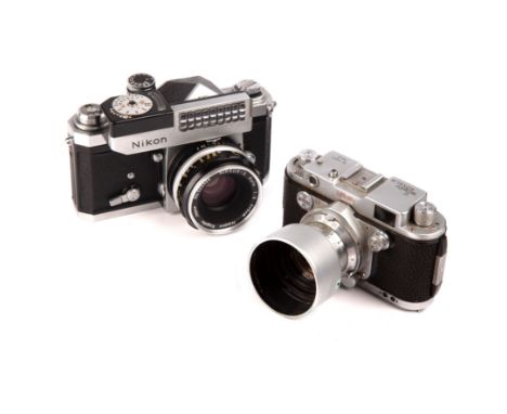 A Robot Royal 36 mod III camera nr x-140727 with a Schneider-Kreuznack xenar 1:2,8/45 lens 4647770 together with a Nikon F wi