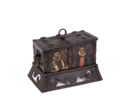 A 17th century German iron casket, with strap work decoration painted with flowers and figures to the front, having an engrav