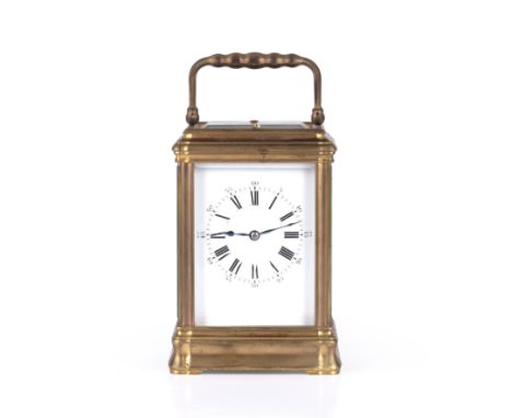 A late 19th century French carriage clock, the enamelled dial with Arabic and roman numerals, 10cm wide x 8.5cm deep x 14cm h