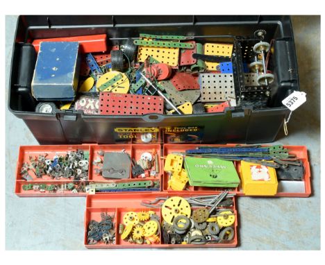 Meccano quantity of parts various periods in green, red, blue, yellow and nickel includes angle girders, perforated strips, f