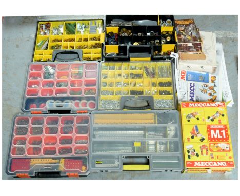 Meccano a quantity of loose parts including flexible plates, angle girders, perforated strips, brassware including contrate w