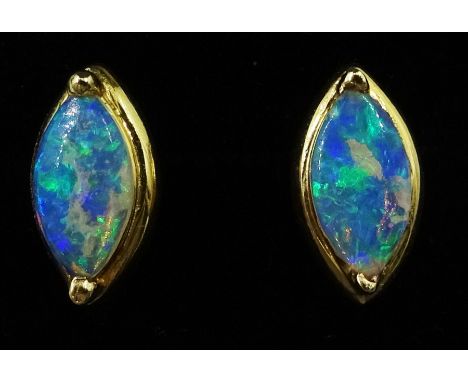 Pair of 14ct gold marquise shaped opal stud earringsCondition Report:Approx 0.9gm, head = 10mm x 5.5mm