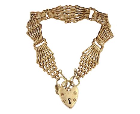 9ct gold fancy bar gate bracelet, with heart locket clasp, hallmarked Condition Report:Approx 21.38gm