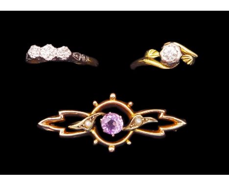 Gold single stone diamond ring and a three stone diamond ring, both 18ct and a 9ct gold amethyst and seed pearl bar broochCon