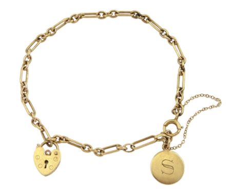 Gold link bracelet, with gold heart locket charm and 'S' charm, all 9ctCondition Report:Approx 7.15gm, length approx 19cm