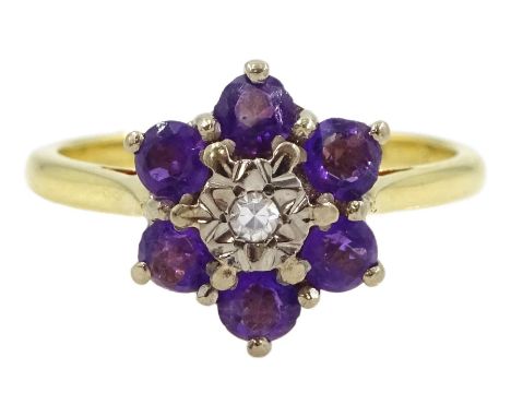 18ct gold amethyst and diamond cluster ringCondition Report:Approx 3.85gm, tested 18ct, size O-P, head diameter = 11.5mm, goo