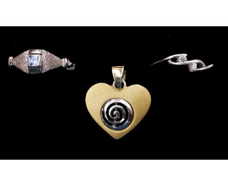 Two 14ct white gold stone set rings and a 14ct yellow and white gold heart pendant Condition Report:Approx 6.75gm, ring sizes