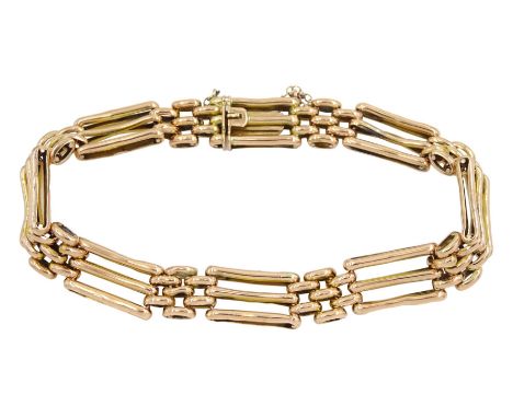 Gold three bar gate bracelet, stamped 9ctCondition Report:Approx 13gm