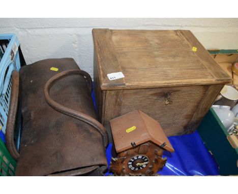 An oak cantilever tool box together with a small cuckoo clock and a leather bag