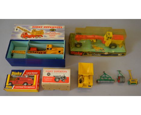 Four boxed Dinky Toys, 562 Dumper Truck, 963 Road Grader, 972 Coles Lorry Mounted Crane and 282 land Rover Fire Appliance. Mo