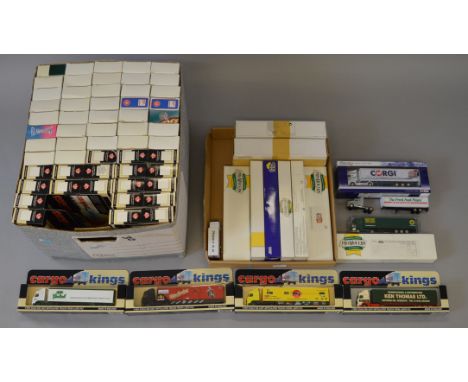 A good selection of boxed Lledo and Corgi including  'Cargo Kings' and 'Promovers' diecast model articulated trucks in 1:76 s