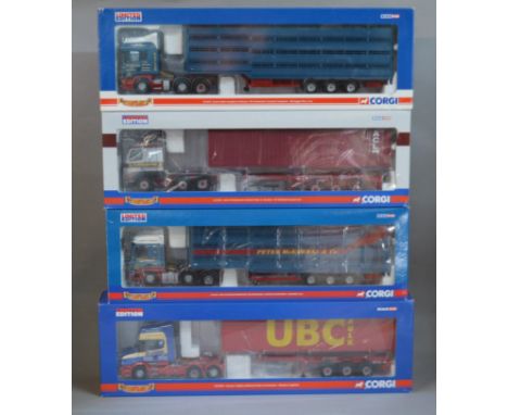 Four boxed Corgi 1:50 scale diecast model trucks, CC13614, CC12430, CC12919 and CC12816, with unattached bagged mirrors and '