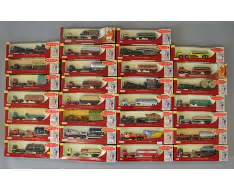 Thirty boxed Lledo 'Trackside' diecast articulated truck models in 1:76 scale. Models appear G+ in generally G/G+ packaging. 