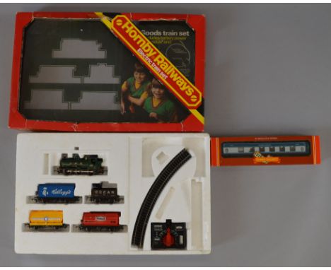 OO Gauge Hornby. GWR goods train set, missing track pieces together with boxed Golden Arrow coach. Overall F/G