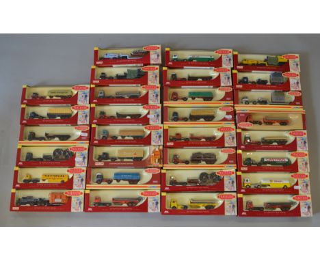 Thirty boxed Corgi and Lledo branded 'Trackside' diecast articulated truck models in 1:76 scale. Models appear G+ in generall