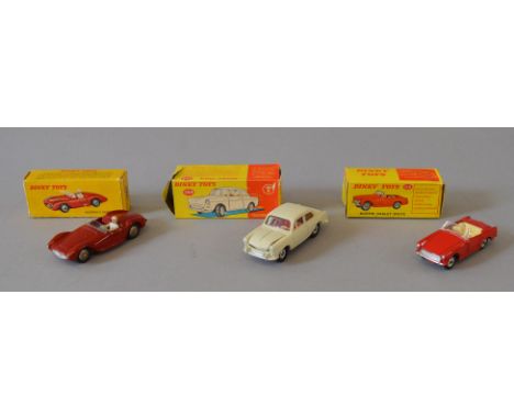 Three boxed Dinky Toys, 112 Austin Healey Sprite, 144 Volkswagen 1500  with one piece of luggage and French Dinky 22A Maserat