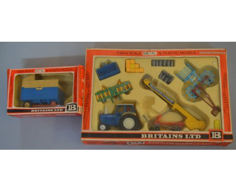 A boxed Britains 9590 Ford Tractor and Farm Implements Set, missing a plastic figure otherwise overall F/G, in F window box t