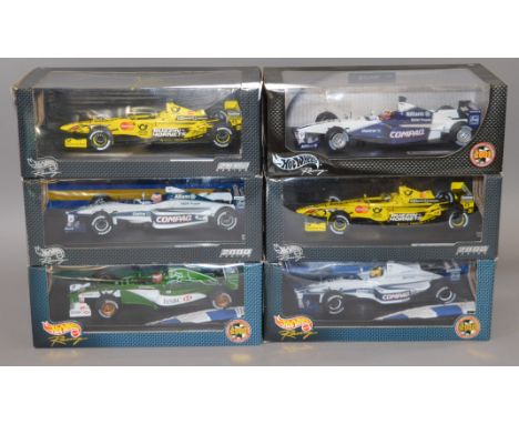 Six boxed Hot Wheels 1:18 scale diecast model Racing Cars. Overall models appear G+ in F to G boxes. (6)