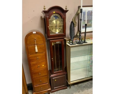 A modern moon roller triple weight long case clock made by Interclock of Belgium 