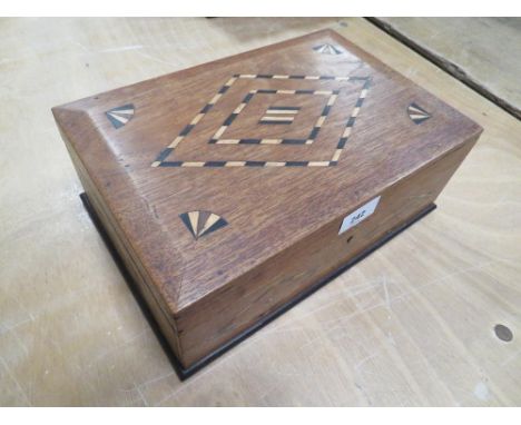 A vintage inlaid mahogany box with drawers 