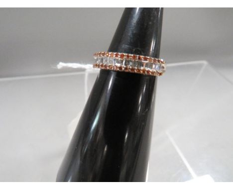 A hallmarked 9 carat gold diamond and cognac diamond ring approx. weight 2.8g 