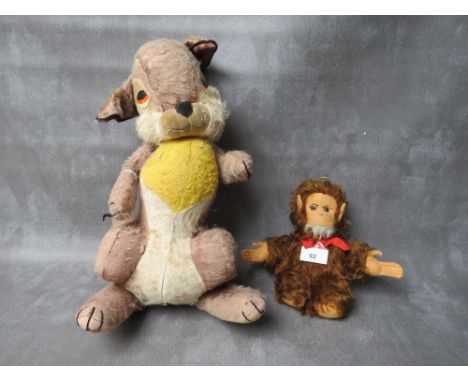 A VINTAGE MERRYTHOUGHT MUSICAL 'THUMPER' SOFT TOY, H 41 cm, together with a musical Music Reuge bear in the form of a monkey,